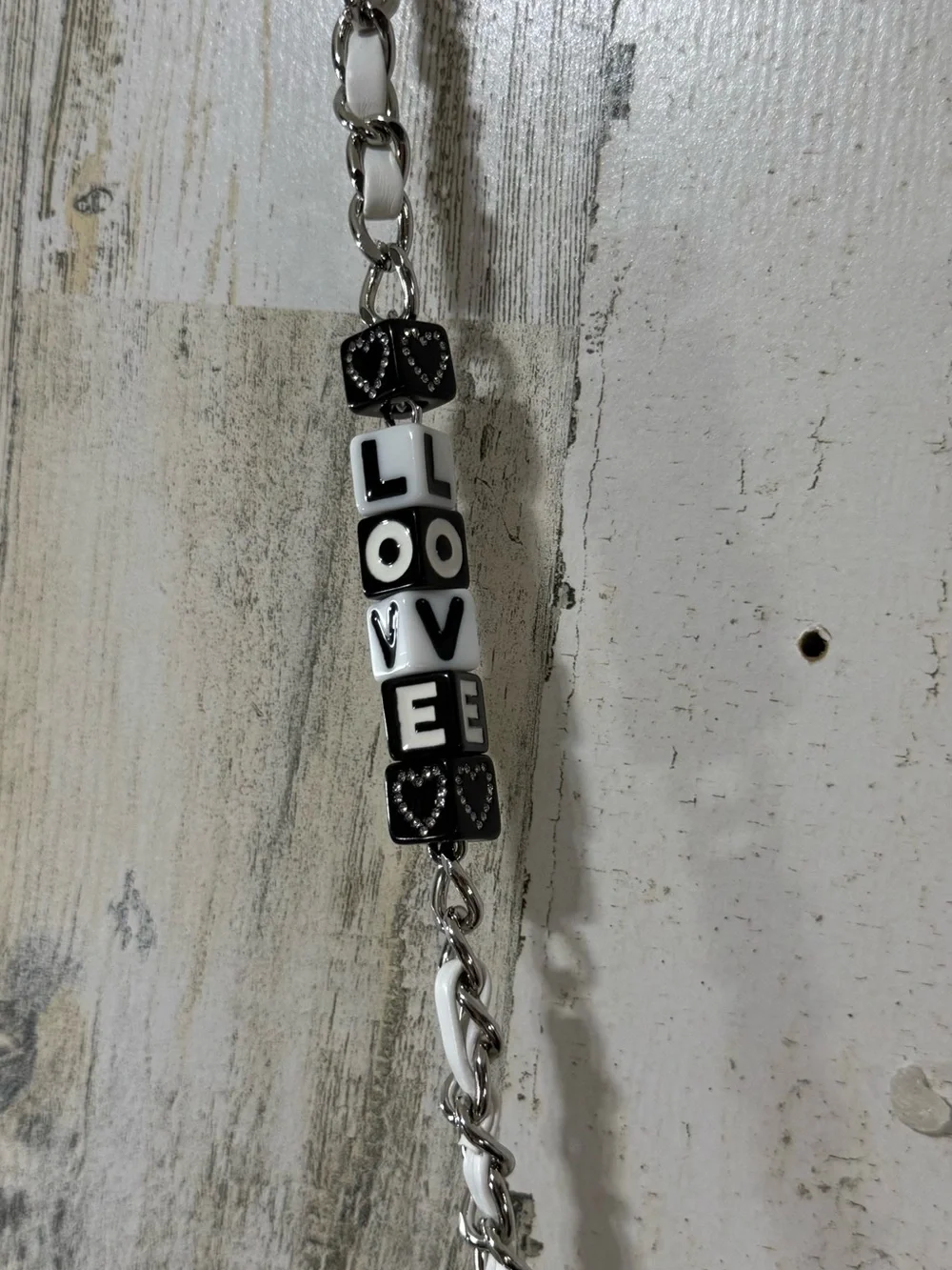 White Quilted Crossbody Bag with Chain Strap and Beaded 'LOVE' Accent